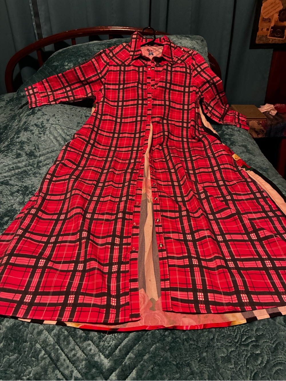 Women’s pink and black snap-front duster.